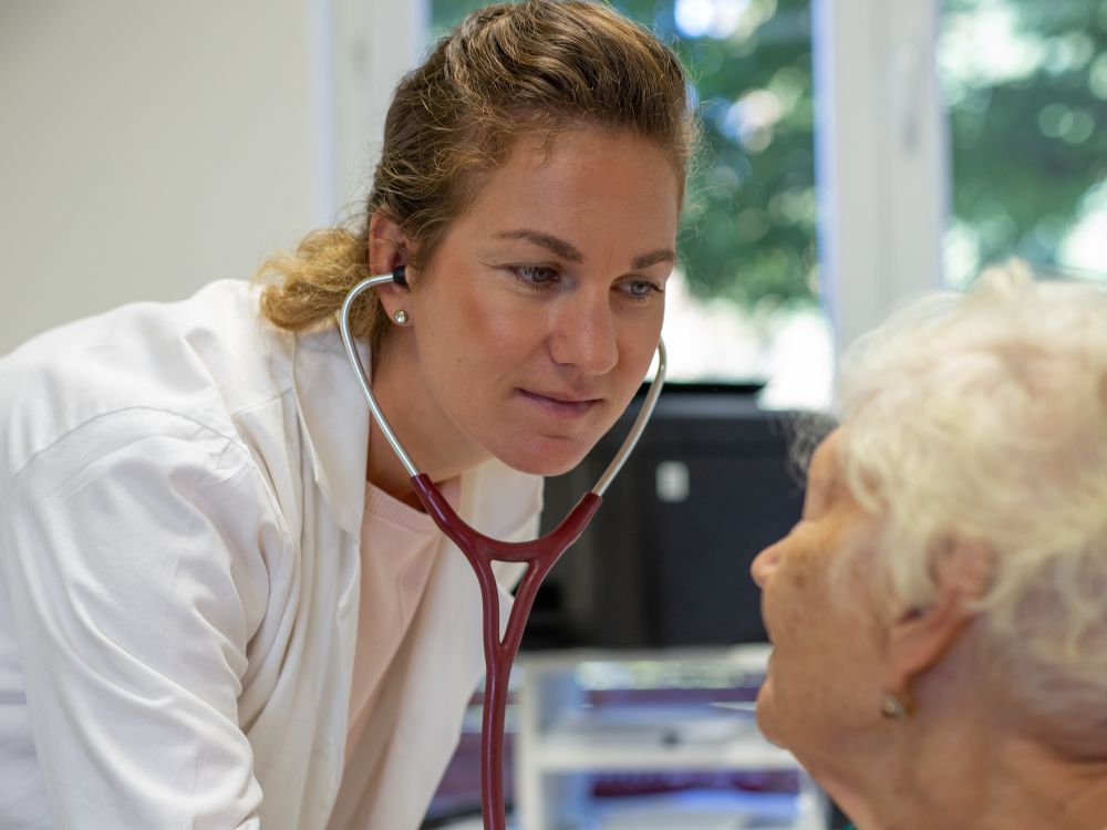 Preventative Care. Doctor Seeing a Patient